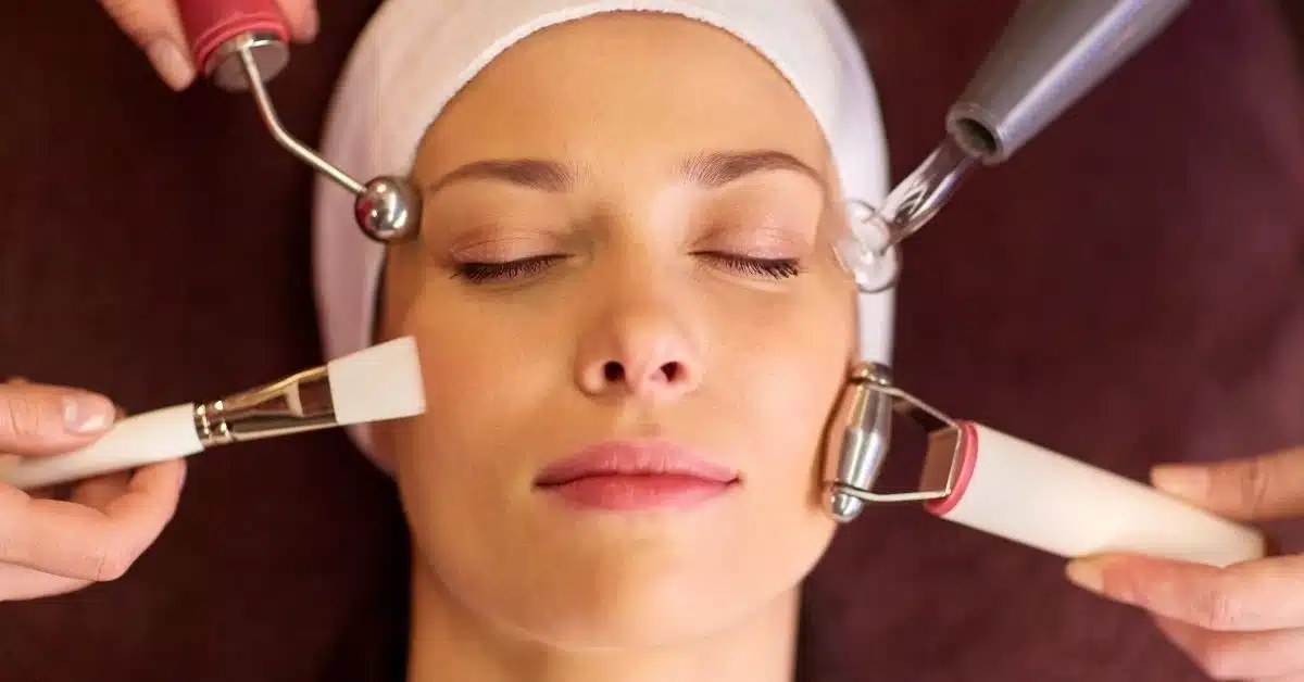 woman-enjoying-a-relaxing-sculptra-facial-massage-at-spa - face - massage - skin-care - therapy - Sculptra